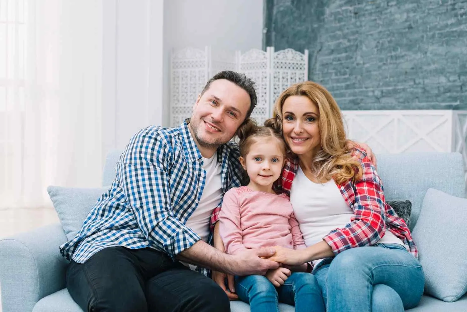 Happy family protected by insurance